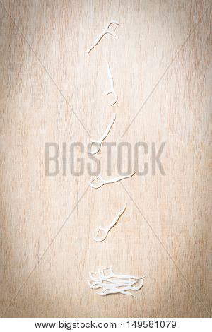 Oral Device : Dental Flossers On Wooden Background