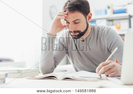 Man Studying At The Library