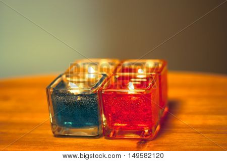red yellow orange white  blue candle .