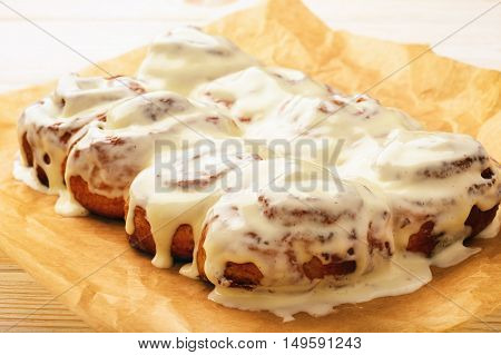 Cinnamon buns glazured with cream cheese  .