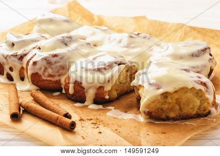 Cinnamon buns glazured with cream cheese  .