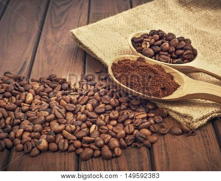 bag of coffee beans scattered on the table