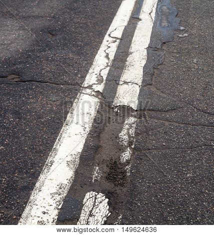 Double white marking line on the old road.
