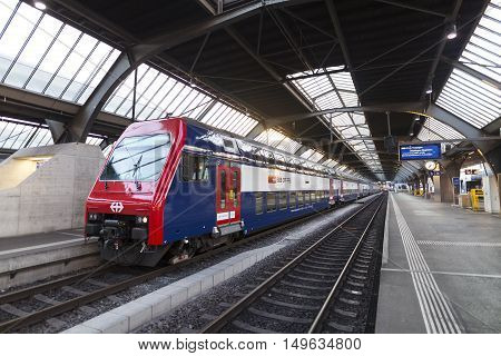 SWISS FEDERAL RAILWAYS, SWITZERLAND - Sep 12: The train in Switzerland on Sep 12, 2016. The SBB CFF FFS train is stationed in Zürich Hauptbahnhof platform, waiting to bring passengers to Zermatt.