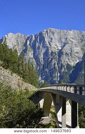 The Slovenian side of the Italian Slovenian border near the start of the Mangrt road. This road crosses the Predelica Ali Predilnica river.