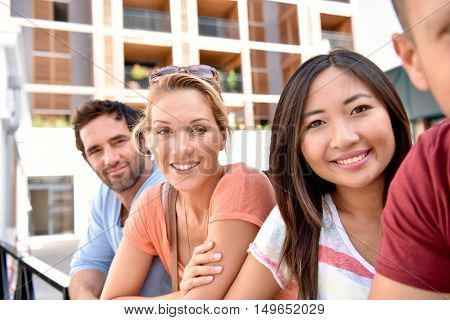 Young multi-racial peole in student city