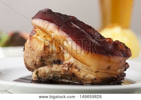 close up of frankonian schaeufele, roasted pork portion.