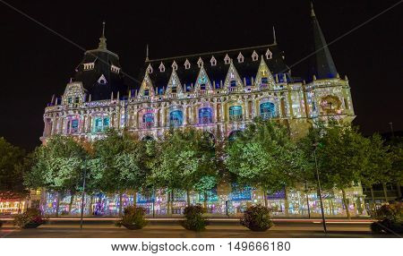 The media library Apostrophe illuminated during Chartres Light scenographic show. Colorful light illumine historic places and some principal buildings throughout the event.