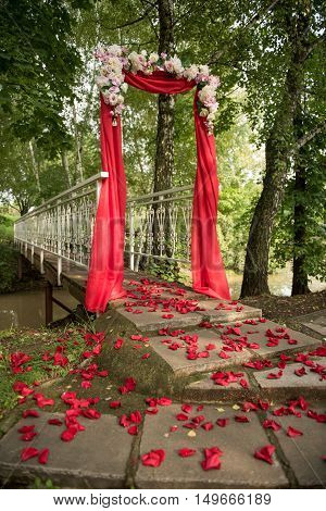 wedding decor flower arch of red color