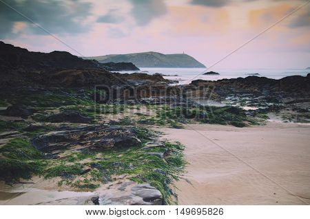 Early Morning View Over The Beach At Polzeath Vintage Retro Filter.