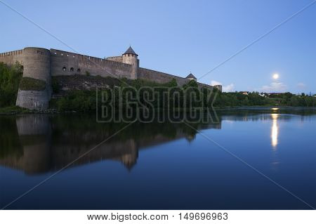 View of the old Ivangorod fortress during the white nights. Russia