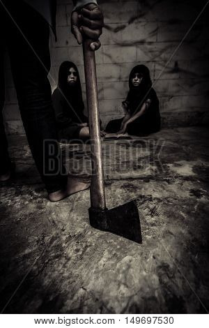 Serial killer with hatchet and ghost girls in background,Scary background for book cover ideas