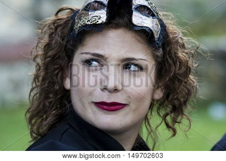 CAGLIARI, ITALY - June 1, 2014: Sunday at La Grande Jatte public gardens - Sardinia - portrait of a beautiful girl in Victorian costumes