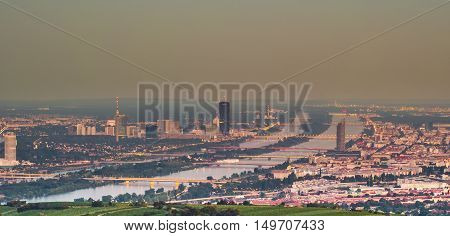 Beautiful view of skyline of Vienna and Danube River with green trees of Doebling district, Austria. Travel photo of the landmark.