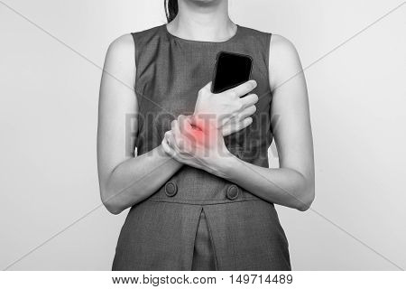 a business woman having a wrist pain