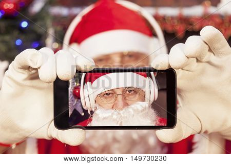 Santa Claus Take A Selfie With Smart Phone