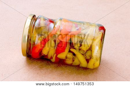 picture of a Pickled chilli paprika in jar ready for winter