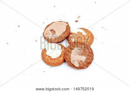 Chocolate cookies with cream filling isolated on white background.
