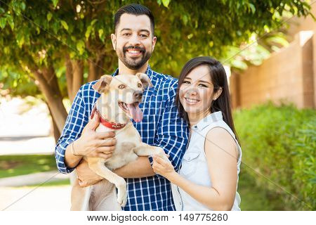 Beautiful Couple With A Dog