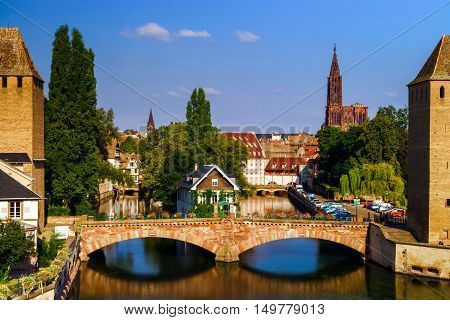 Old Historical Center Of Strasbourg. Fortress Towers And Briges In Little France With Reflection In