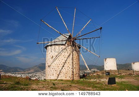 Traditional windmill in Bodrum resort town of Mediterranean Turkey