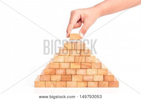 Hand Holding Blocks Wood Game (jenga) Isolated On White Background. Risk Concept