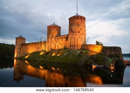 Fortress Olavinlinna in the summer twilight. Savonlinna Finland