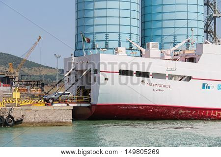 Piombino Italy - June 30 2015: Ferry boat Marmorica unload a vehicle. Ferry with capacity 470 passengers and 106 vehicles