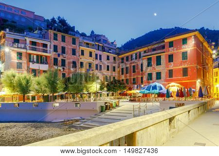 The old main square on the waterfront in the Italian village of Vernazza at night. Parco Nazionale delle Cinque Terre, Liguria, Italy.