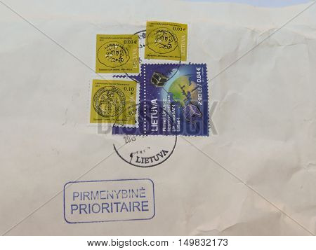 VILNIUS LITHUANIA - CIRCA FEBRUARY 2015: mail stamps with postage meter over priority (pirmenybine prioritaire) mail envelope