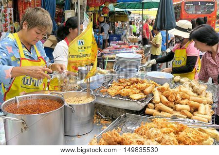 CHINATOWN, BANGKOK,THAILAND-SEPTEMBER 25, 2016:street food at Yaowarat Road. Yaowarat road is various products such as street food, gold shop.Restaurant., Famous and Popular destinations for tourists.