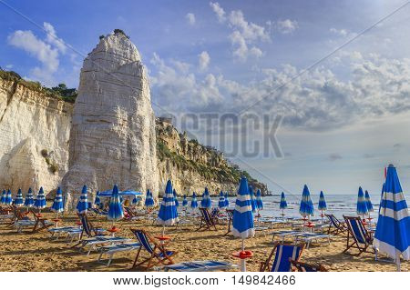 Gargano coast: bay of Vieste,(Apulia) ITALY.Castello or Scialara beach:it is  overshadowed by the Swabiam Castle and the Pizzomunno Monolith (from the local dialect: peak of cape of the world).