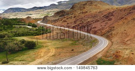 Beautiful landscape with winding road in the mountains. Altay mountains, Siberia, Russia.