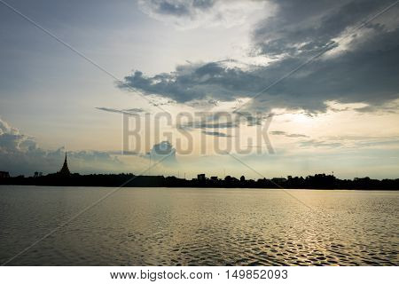 Silhouette temple thai name "Wat Nong Wang or Pramahatat kaen nakron" is located in Khonkaen Thailand beautiful sky while sunset.
