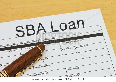 Applying for a SBA Loan SBA Loan application form with a pen on a desk