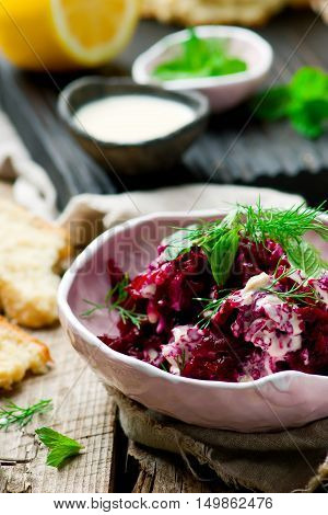 Beet salad with tahina sauce .selective focus