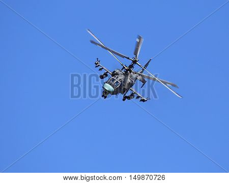Modern russian attack helicopter Ka-52 with rockets bombs guns