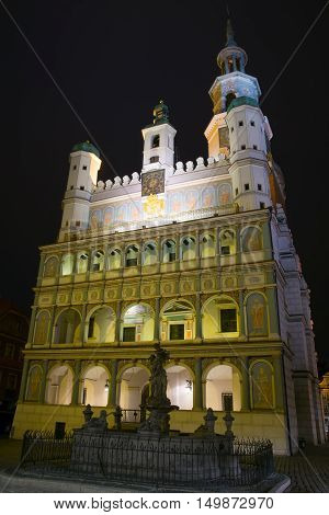 Poznan Poland - September 30 2016: Night photo of Poznan Old Town with Prozerpin's fountain and beautifully decorated facade of the city hall.