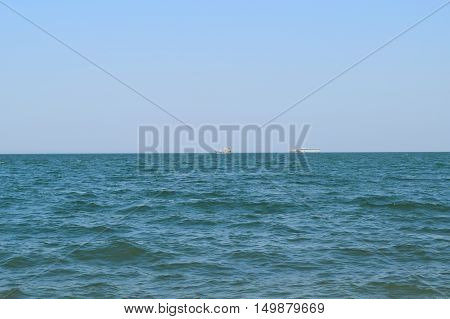 Seascape And Two Ships On The Horizon