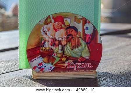Stand For Napkins With Painted Cossack And A Cossack Woman