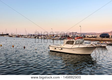 Traditional Greek fishing boats near pier of Sitia town on Crete island