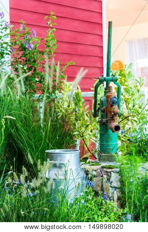 Artesian Well And Bucket.