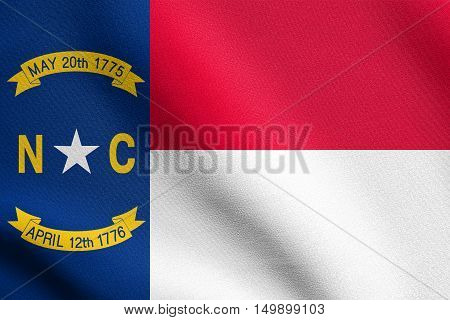 North Carolinian official flag symbol. American patriotic element. USA banner. United States of America background. Flag of the US state of North Carolina waving in wind with detailed fabric texture, illustration