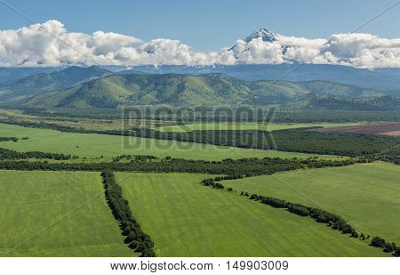 Fields of the Yelizovsky District in Kamchatka Peninsula. View from helicopter.