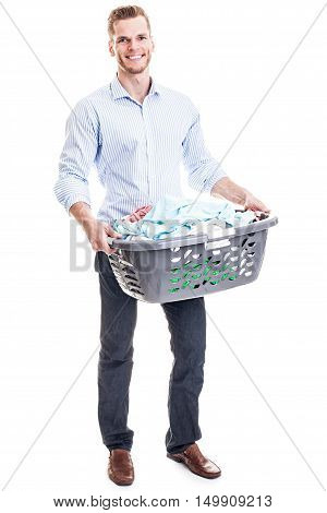 Cheerful Young Man Holding A Basket With Laundry - Isolated On White..