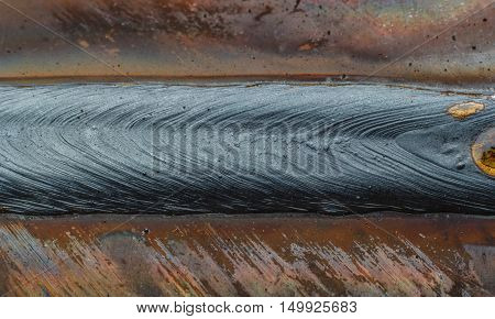 welding seam onto steel sheet metal Industrial steel welder in factory