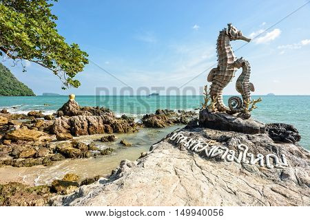 Chumphon Thailand - December 31 2014: Seahorse Statue and Golden Jar Statue on seashore - Landmark at newly famous traditional home stay village Baan Tong Tom Yai Chumphon Province Thailand.