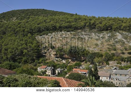 Old village Dol with caves around used for protect the village from pirates picture from Island Brac in Croatia.