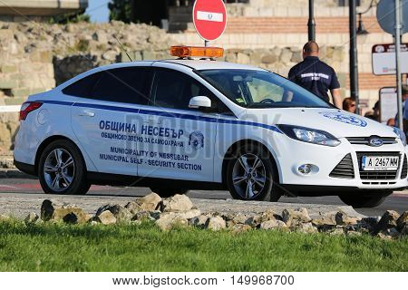 Nessebar Bulgaria - July 16 2016: White Ford Focus Police (Municipality Of Nessebar) Car Parked on the Street in Nessebar on the Bulgarian Black Sea Coast Nobody in Vehicle
