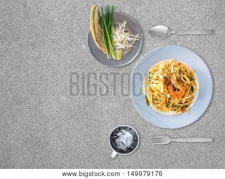 Top view of Pad Thai on the side of the table.